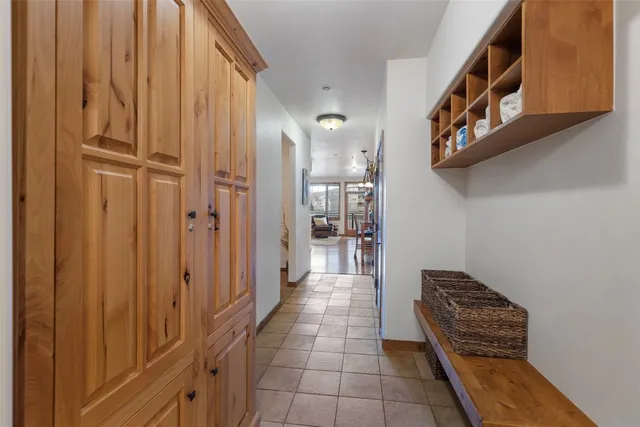 a view of a hallway with entryway