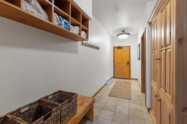 a view of a bedroom with washer and dryer