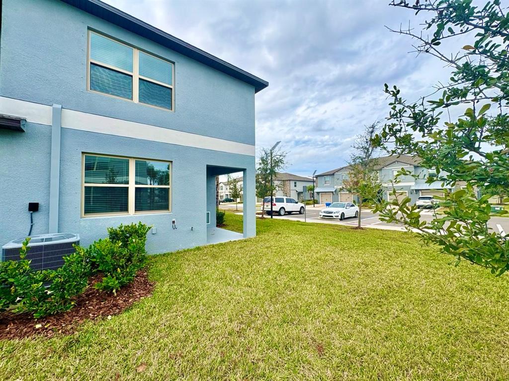 14302 Editors Note Street Ruskin, FL 33573 - Photo 25 of 28 a view of house with yard