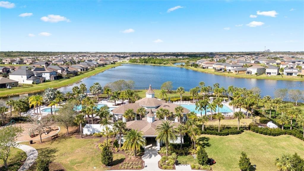 14302 Editors Note Street Ruskin, FL 33573 - Photo 26 of 28 an aerial view of a city with lawn chairs
