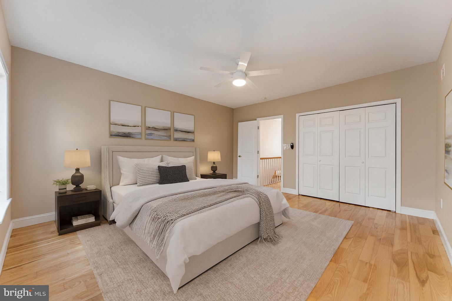 1225 South 7th Street Philadelphia, PA 19147 - Photo 17 of 33 a bedroom with a large bed and a chandelier