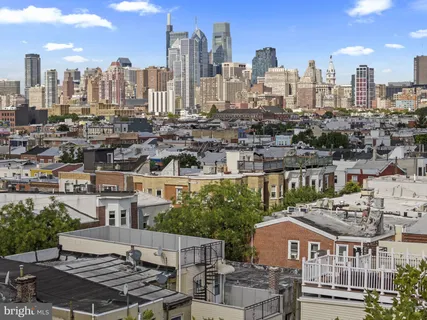 an aerial view of residential house with outdoor space