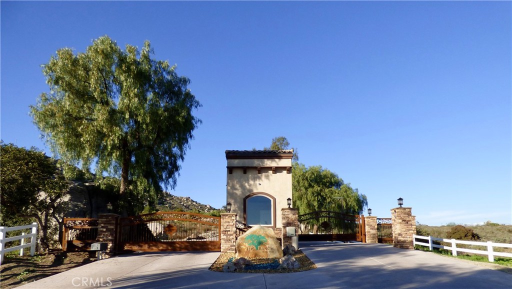 23016 Sky Mesa Road Homeland, CA 92548 - Photo 14 of 16 a front view of a house with a yard
