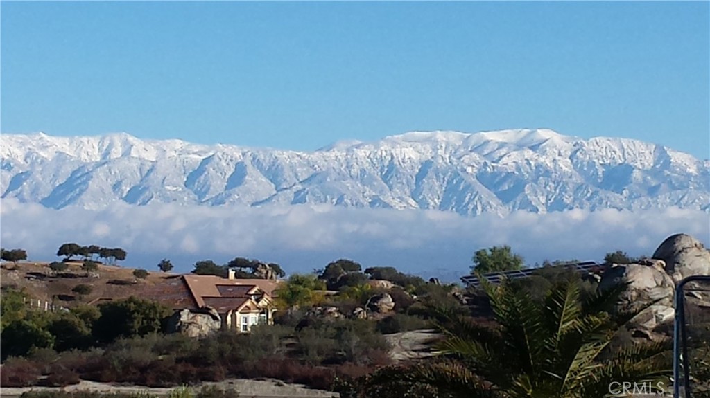 23016 Sky Mesa Road Homeland, CA 92548 - Photo 16 of 16 an aerial view of a house with a yard