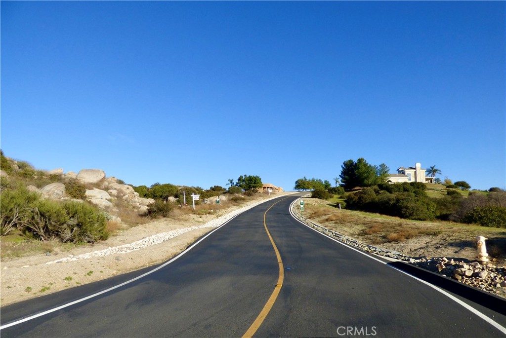 23016 Sky Mesa Road Homeland, CA 92548 - Photo 5 of 16 a view of a balcony with an ocean view