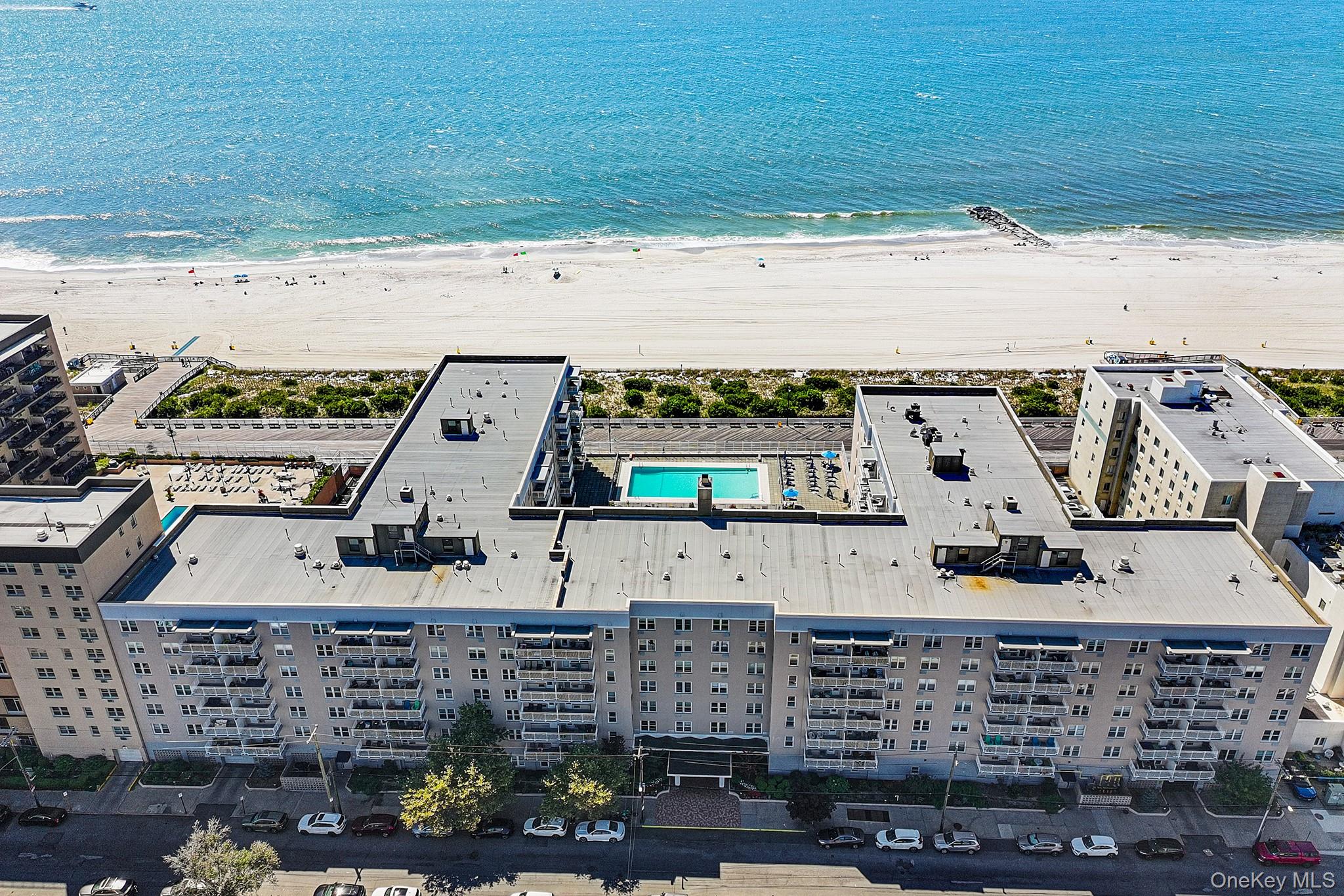 a view of a building with a ocean view