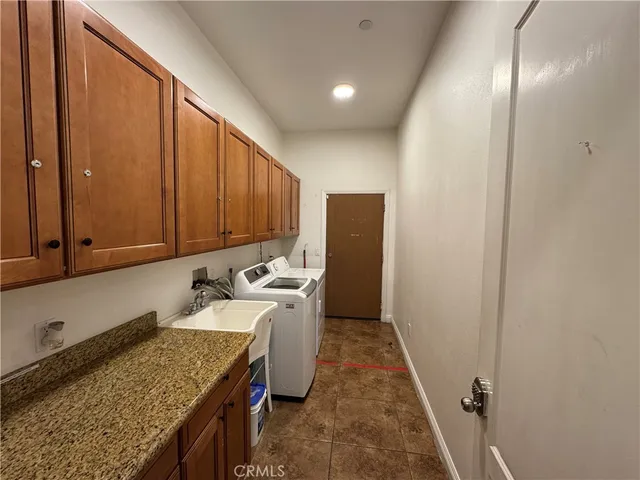 a view of a kitchen with cabinets
