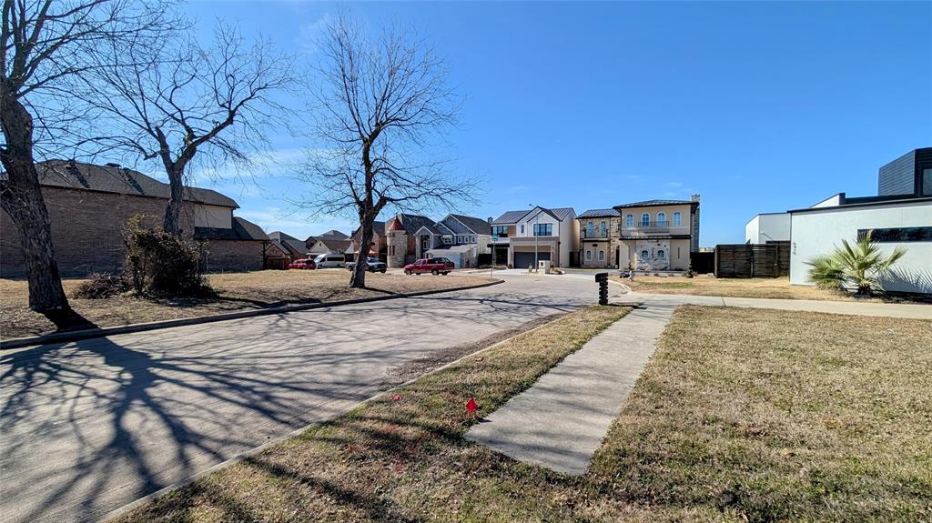 6502 Windward View Drive Rowlett, TX 75088 - Photo 13 of 23 a view of a backyard patio and fire pit