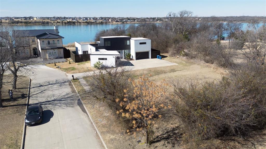 6502 Windward View Drive Rowlett, TX 75088 - Photo 3 of 23 a view of a terrace with a table and chairs