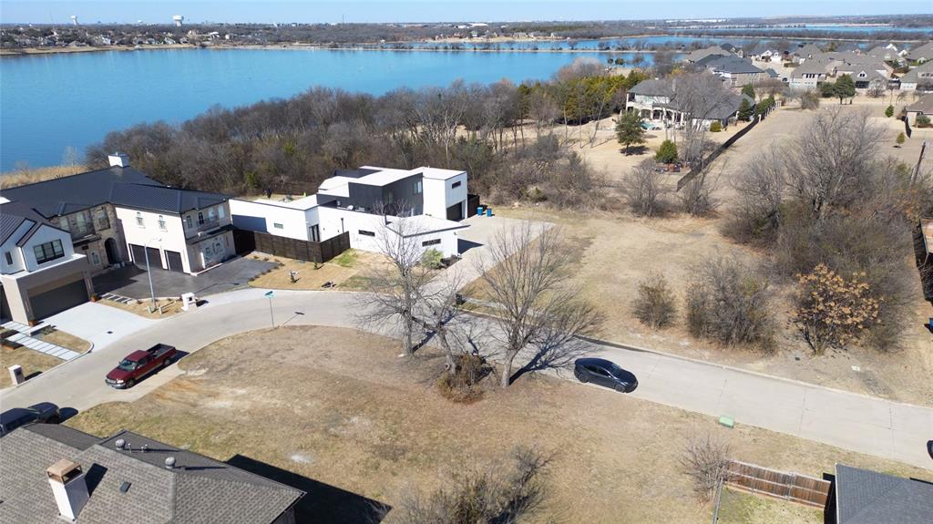 6502 Windward View Drive Rowlett, TX 75088 - Photo 4 of 23 a view of a terrace with swimming pool and sitting space