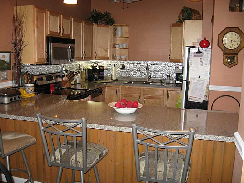 63 Blakeley Street, Unit 106 Woonsocket, RI 02895 - Photo 2 of 14 Kitchen.