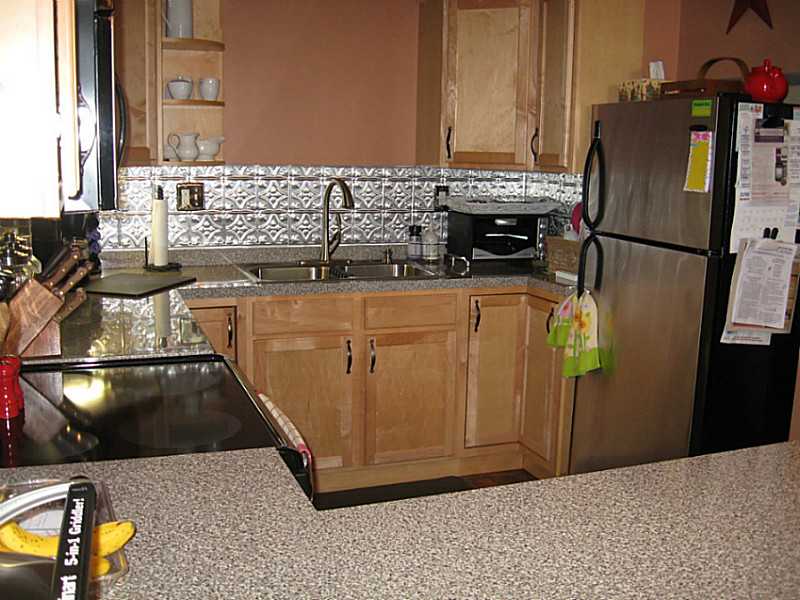 63 Blakeley Street, Unit 106 Woonsocket, RI 02895 - Photo 3 of 14 Kitchen.