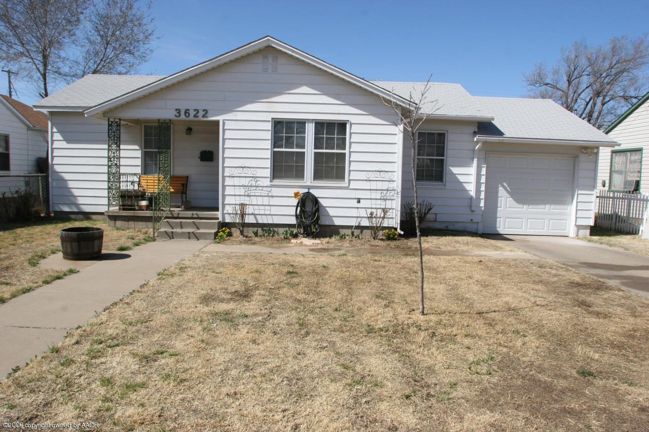 3622 South Travis Street Amarillo, TX 79110 - Photo 1 of 32 a view of a house with a patio
