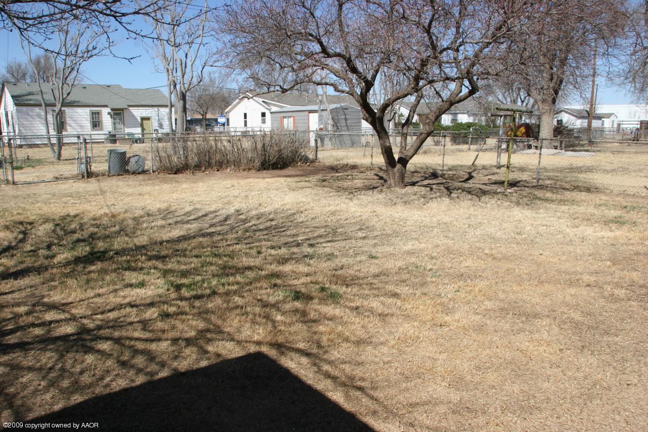 3622 South Travis Street Amarillo, TX 79110 - Photo 28 of 32 a view of yard covered with snow in front of residential house