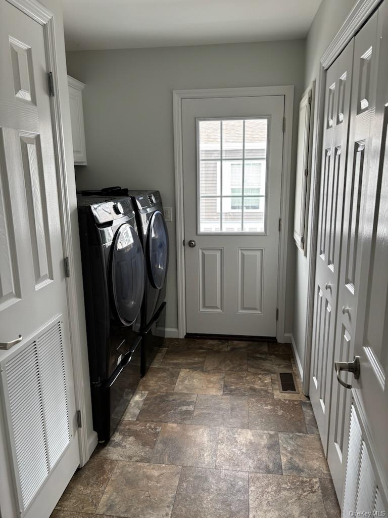 1661 Old Country Road, Unit 539 Riverhead, NY 11901 - Photo 16 of 26 a view of a utility room