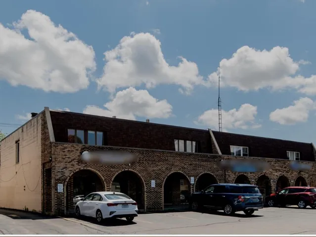a car parked in front of a building