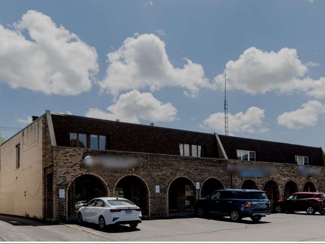 a car parked in front of a building