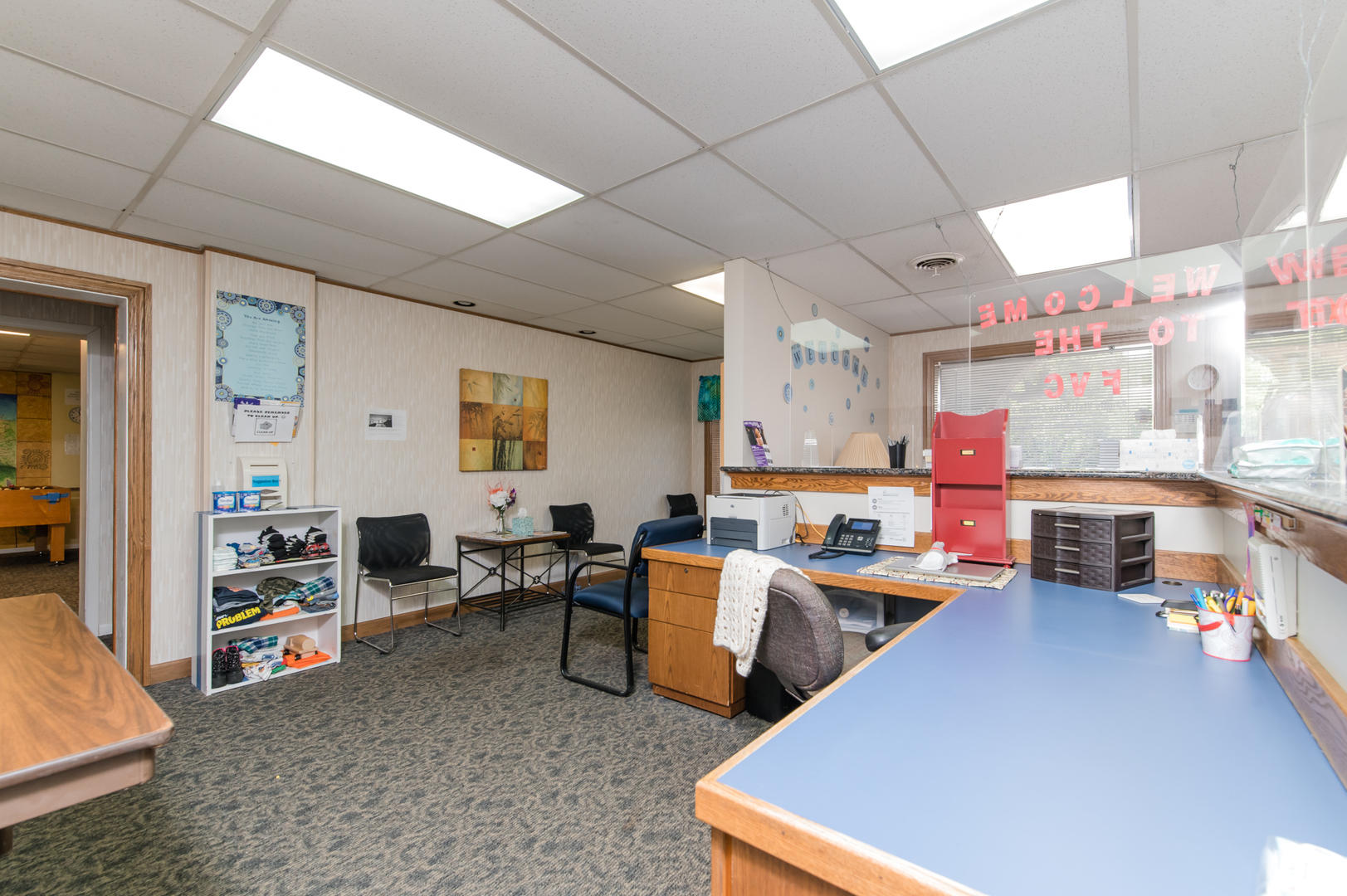 541 North Lake Street, Unit 541 Mundelein, IL 60060 - Photo 4 of 7 a room with lots of furniture and clutter