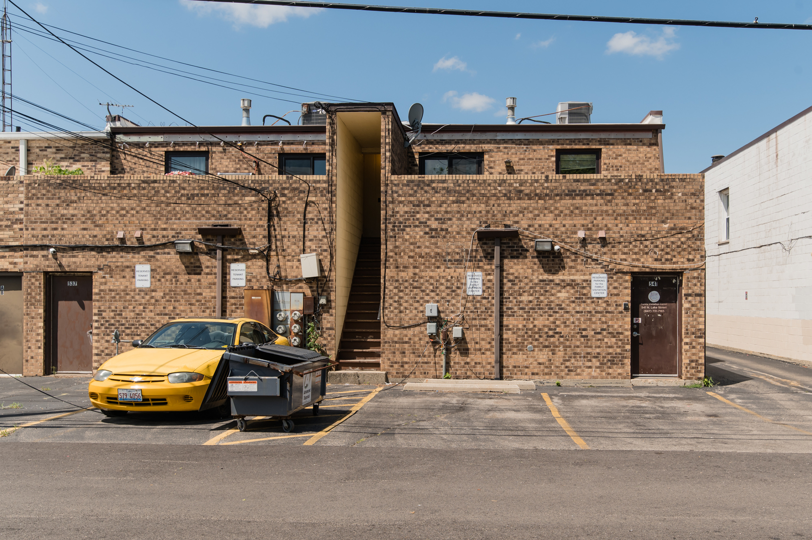 541 North Lake Street, Unit 541 Mundelein, IL 60060 - Photo 7 of 7 a car parked in front of house