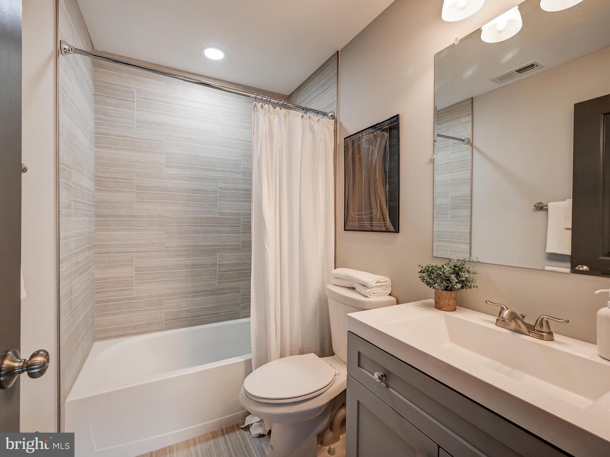 4736 Ridge Road Baltimore, MD 21236 - Photo 40 of 59 Upstairs Hall Bathroom