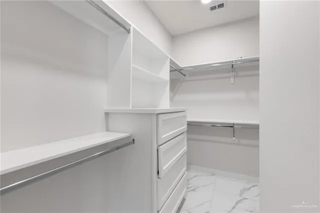 a storage room with cabinets