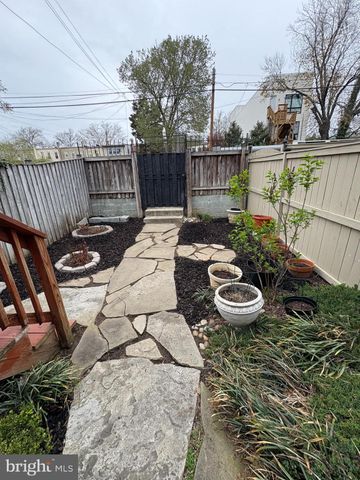 a view of a patio with furniture