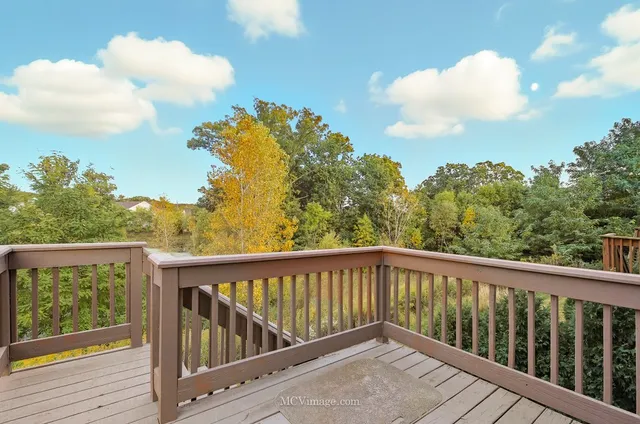 a view of a yard with an outdoor seating