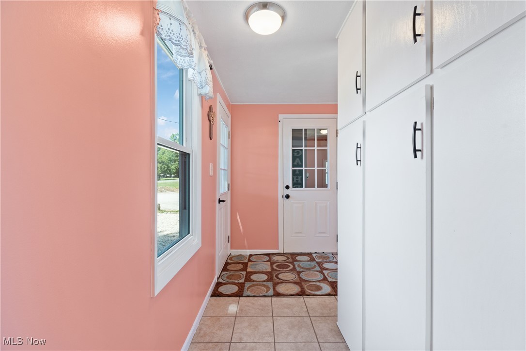 4320 Rootstown Road Rootstown, OH 44272 - Photo 12 of 32 Entryway with tile patterned floors and baseboards