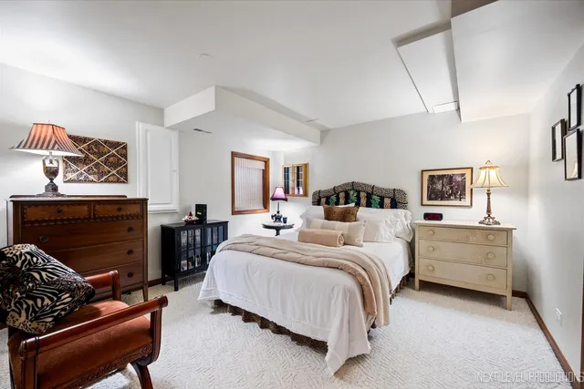 a bedroom with a bed and furniture