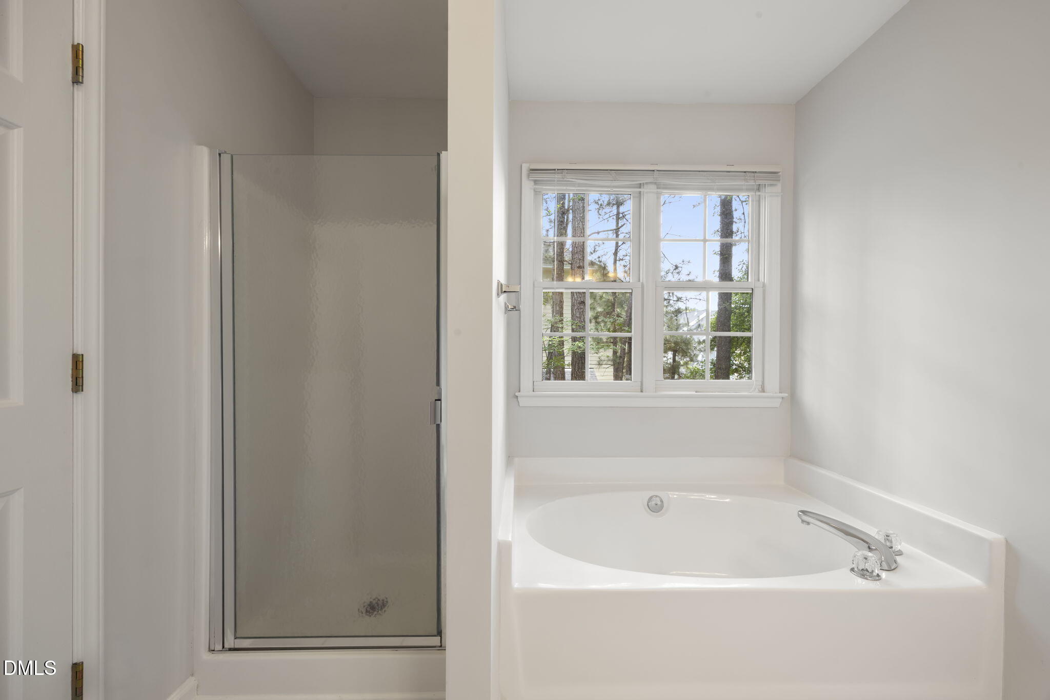 1008 Scotts Ridge Trail Apex, NC 27502 - Photo 30 of 57 a white bath tub sitting next to a window
