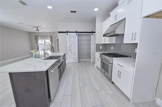 a view of a room with racks on the wall