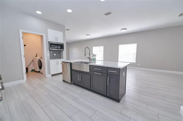 a bathroom with a shower and toilet
