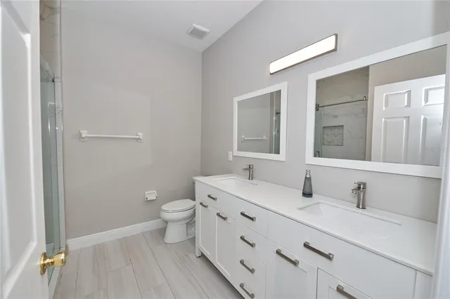 a bed room with a bed and a window