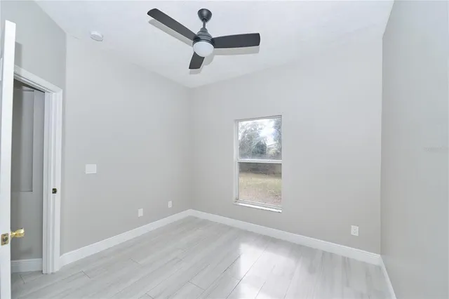 an aerial view of multiple houses with outdoor space