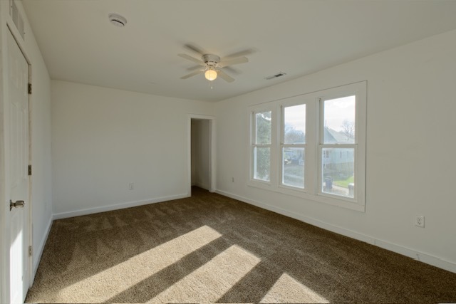 721 South 6th Street Clinton, IA 52732 - Photo 13 of 25 a view of an empty room with a window