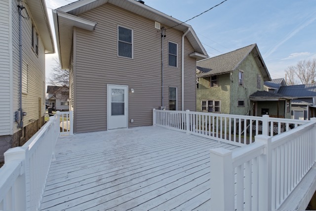 721 South 6th Street Clinton, IA 52732 - Photo 23 of 25 a view of a house with wooden deck
