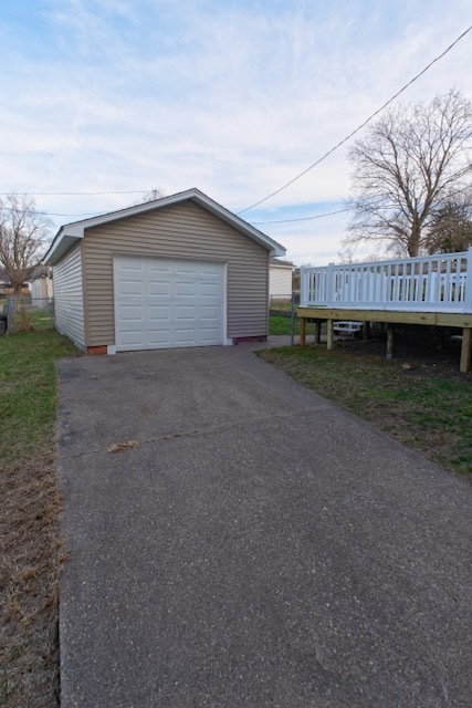 721 South 6th Street Clinton, IA 52732 - Photo 24 of 25 a house with a yard