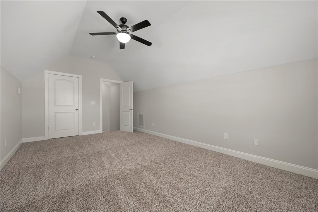 21 Barron Glenn Way Anderson, SC 29621 - Photo 35 of 48 This spacious, well-lit Bonus Room features plush carpeting and a closet for EXTRA STORAGE.