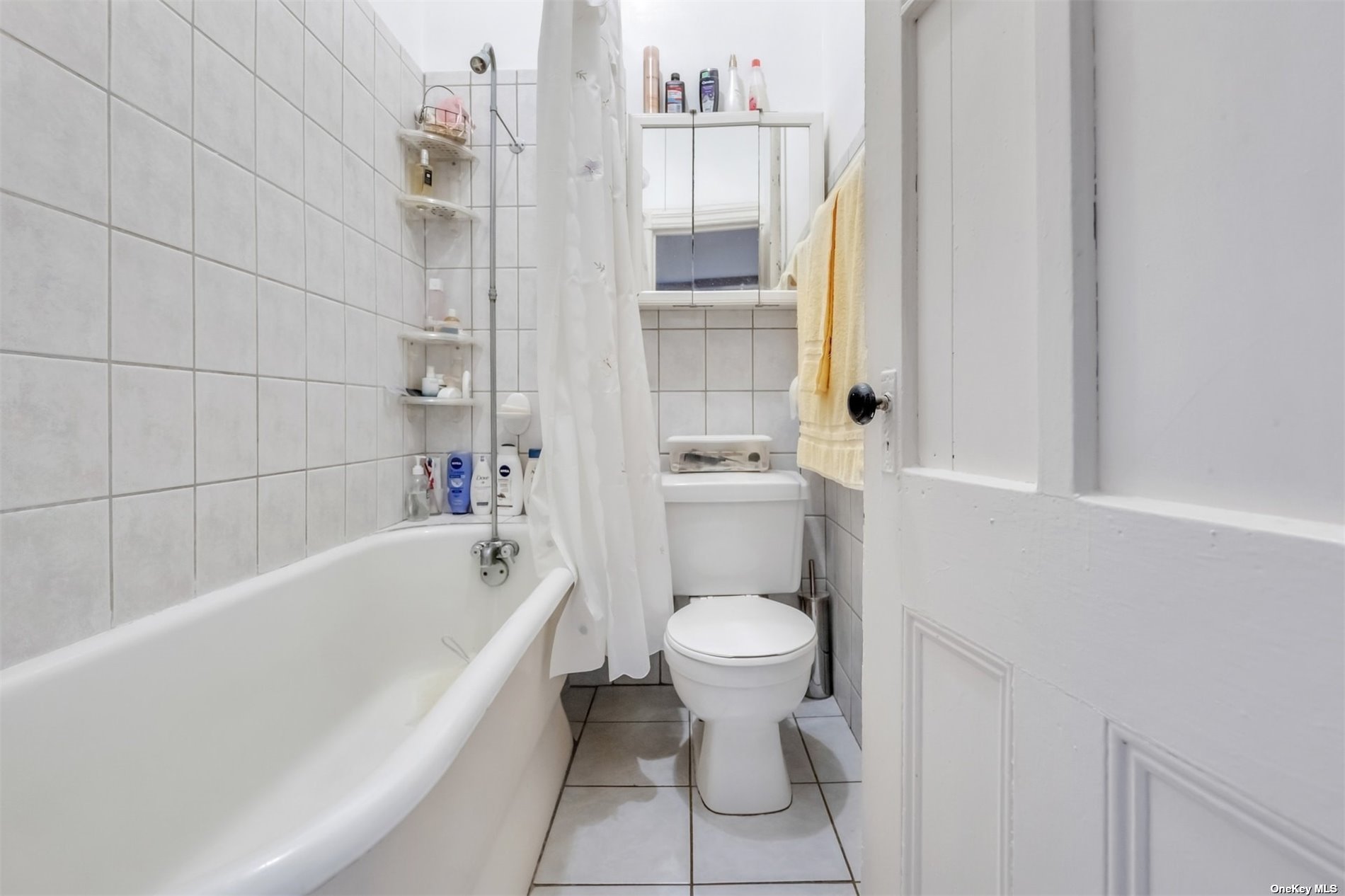 32 Sutton Street Brooklyn, NY 11222 - Photo 19 of 35 a bathroom with a toilet bathtub and shower