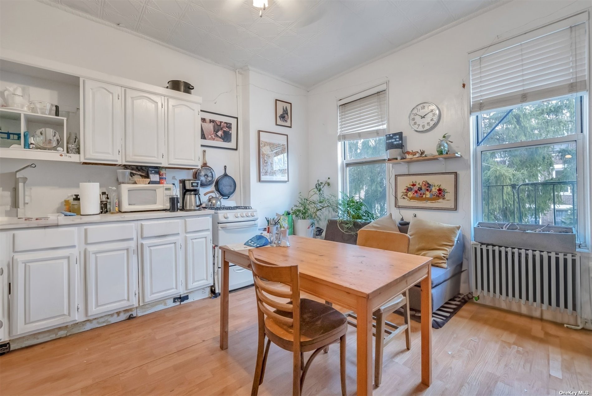 32 Sutton Street Brooklyn, NY 11222 - Photo 22 of 35 a view of a dining room with furniture window and outside view