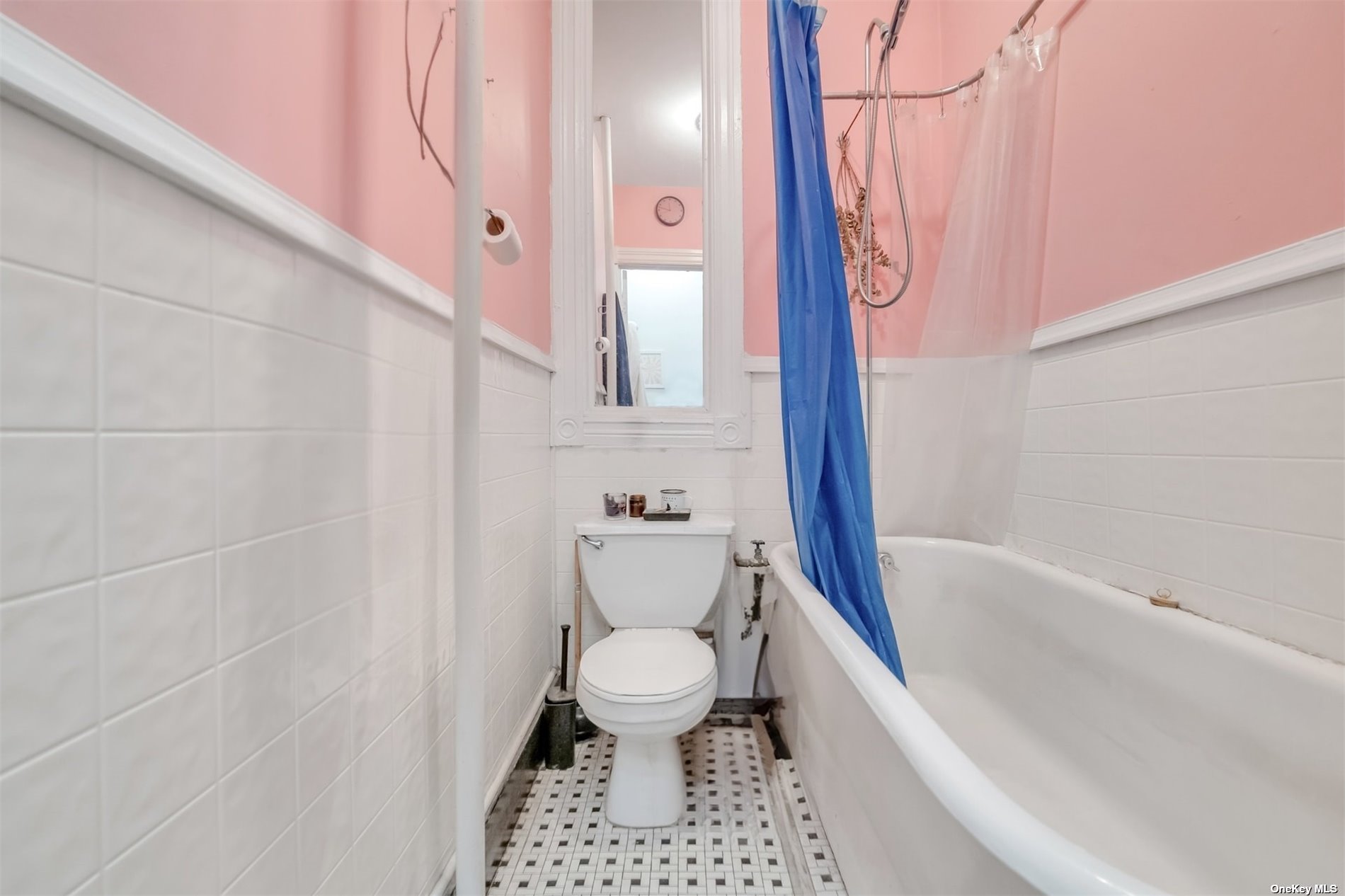 32 Sutton Street Brooklyn, NY 11222 - Photo 23 of 35 a bathroom with a bathtub and a toilet