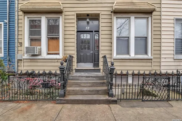 a front view of a house with a window