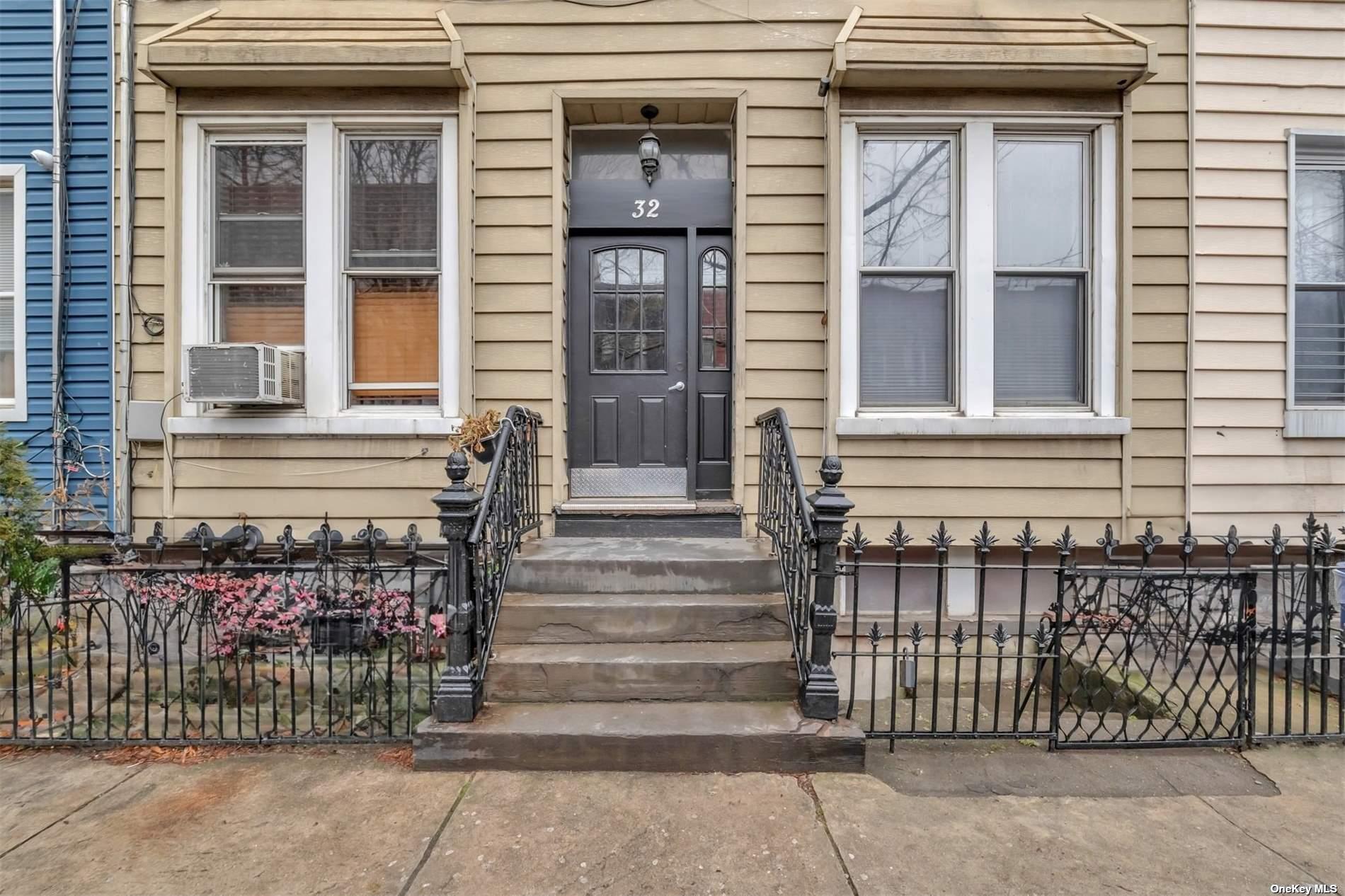 32 Sutton Street Brooklyn, NY 11222 - Photo 3 of 35 a front view of a house with a window