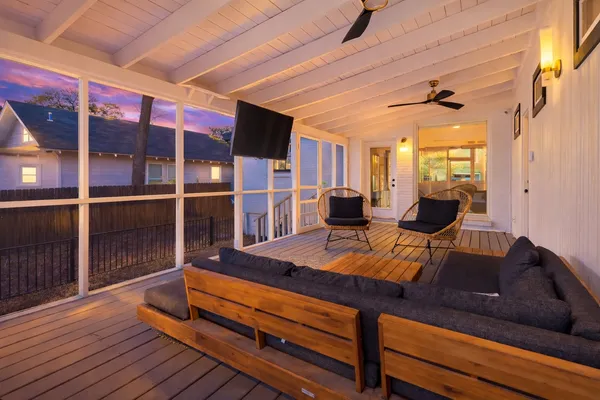 a view of a living room and wooden floor
