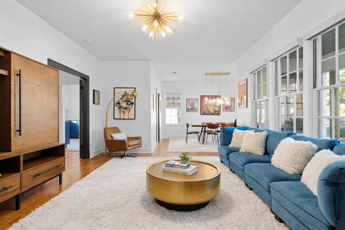 2106 Eva Street Austin, TX 78704 - Photo 7 of 13 a living room with furniture and a flat screen tv