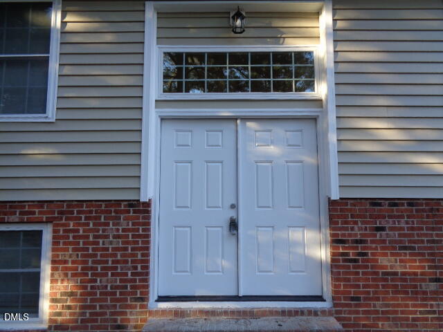 4126 Deep Hollow Drive Raleigh, NC 27612 - Photo 3 of 20 Front Door 4126 Duplex