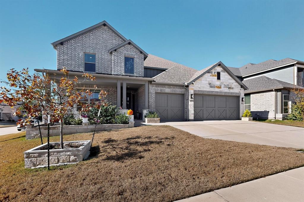 4036 Fanleaf Loop Melissa, TX 75454 - Photo 2 of 19 a front view of a house with garden