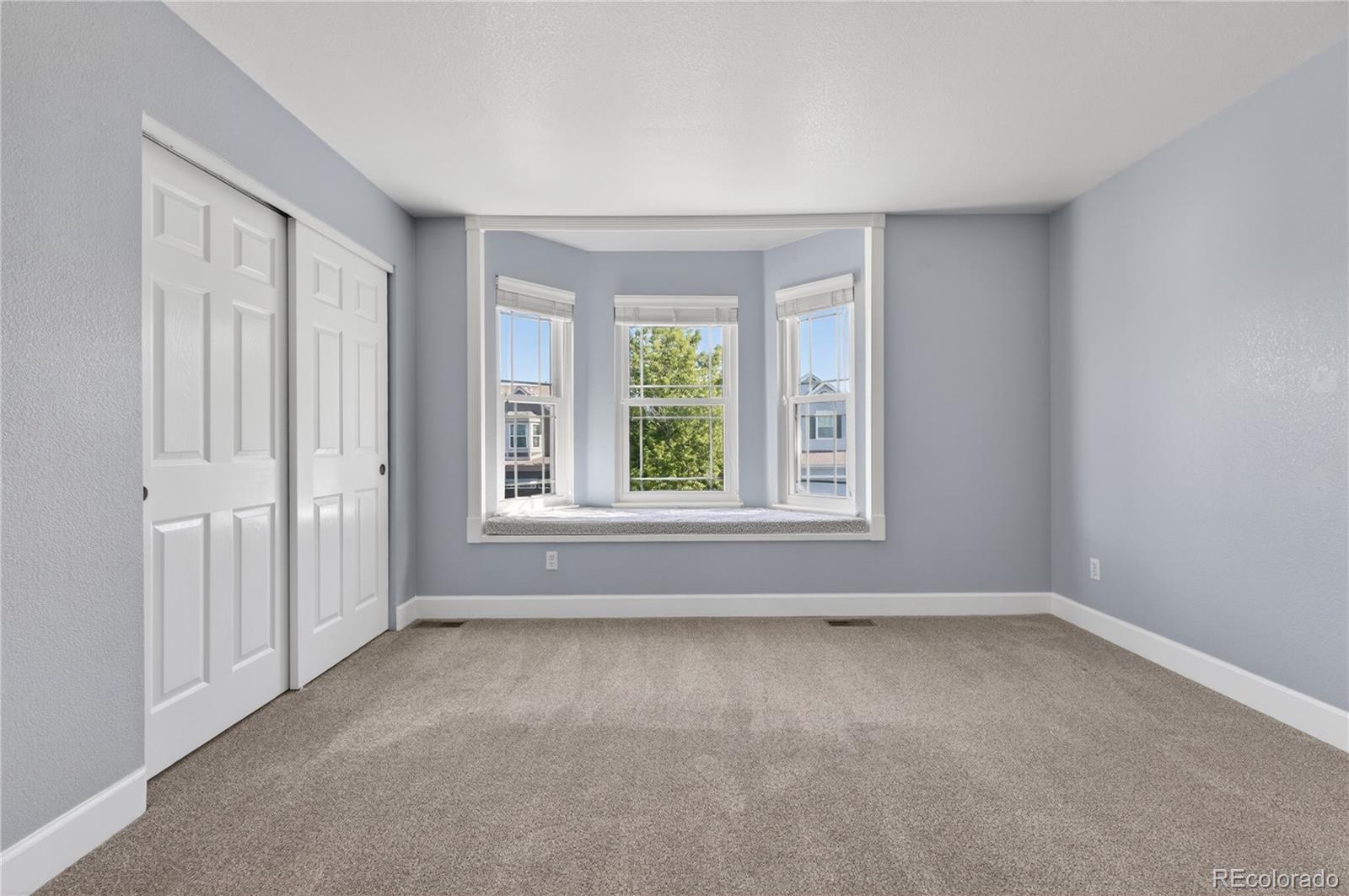 1774 Spring Water Place Highlands Ranch, CO 80129 - Photo 28 of 49 a view of an empty room with a window