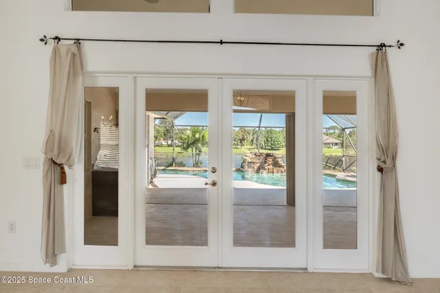 a view of an entryway with a chandelier