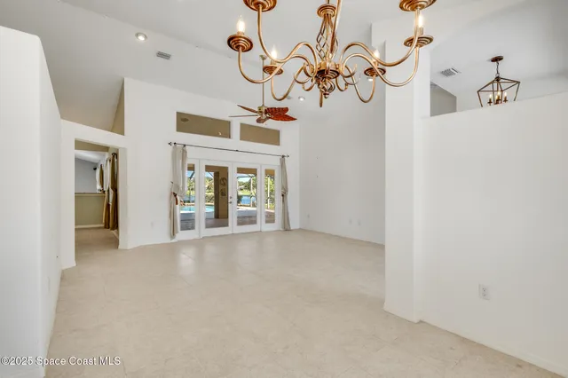 a view of a kitchen with a refrigerator